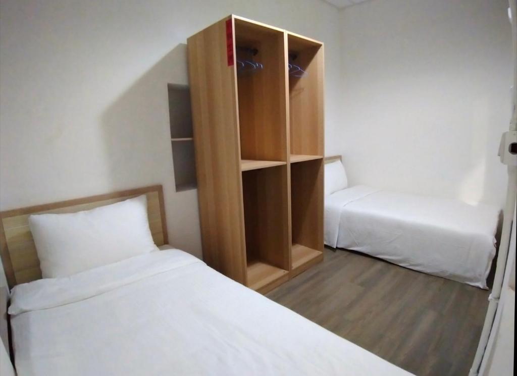 Postel nebo postele na pokoji v ubytování PURE st-ay