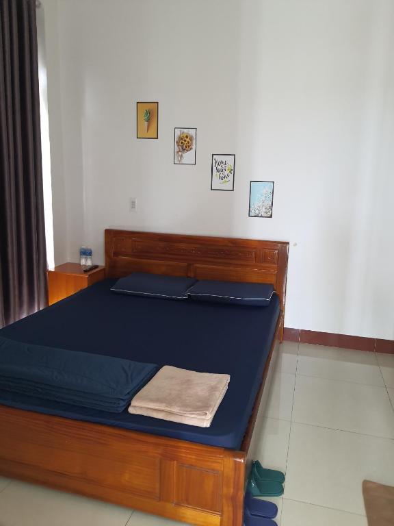 Giường trong phòng chung tại Homestay Hoài Tâm Phan Thiết