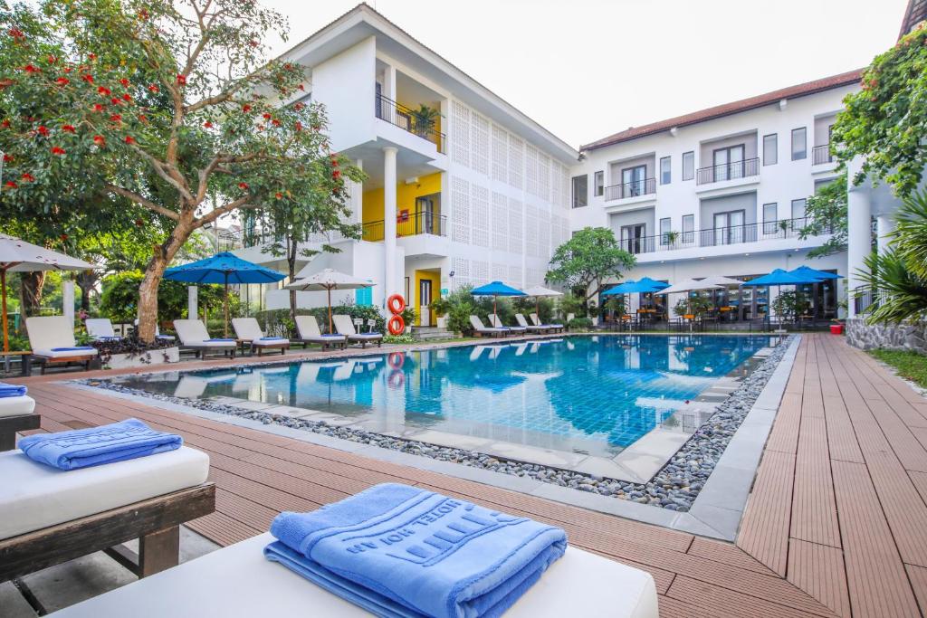 Bazén v ubytování ÊMM Hotel Hoi An nebo v jeho okolí
