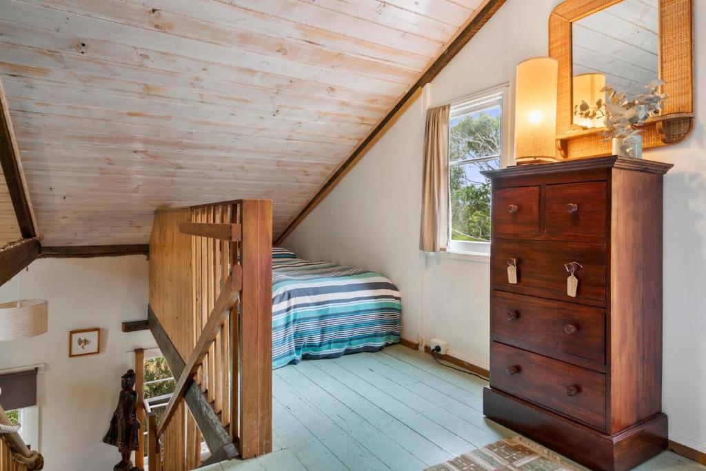 Postel nebo postele na pokoji v ubytování Mandala Bruny Island