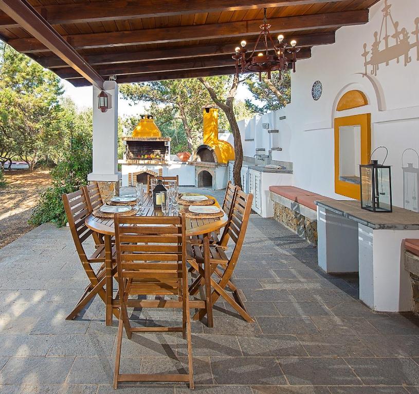 A balcony or terrace at Beachfront Villa SeaShell Superior