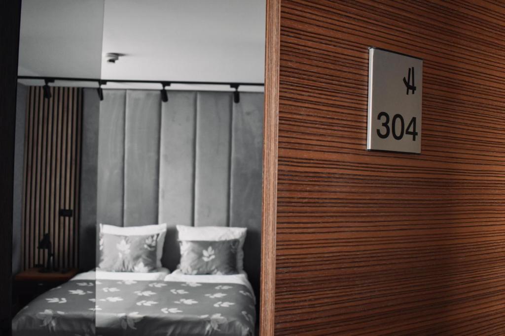 Postel nebo postele na pokoji v ubytování Hotel City View Deluxe