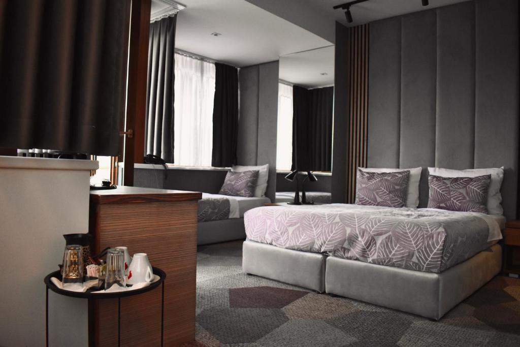 Postel nebo postele na pokoji v ubytování Hotel City View Deluxe