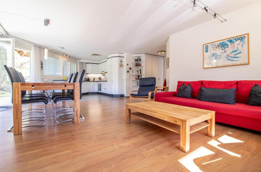 Posezení v ubytování Camana Wohnung EG