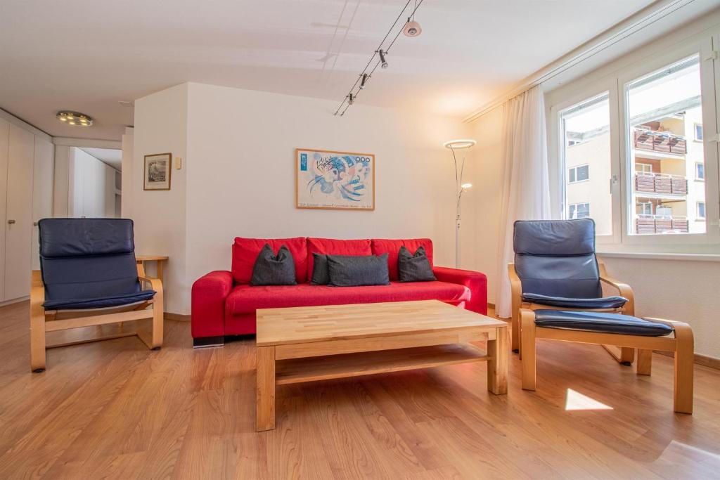 Posezení v ubytování Camana Wohnung EG