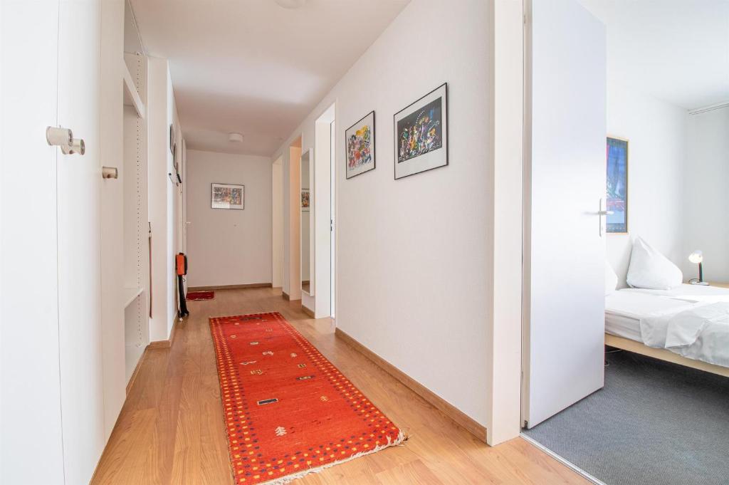Postel nebo postele na pokoji v ubytování Camana Wohnung EG
