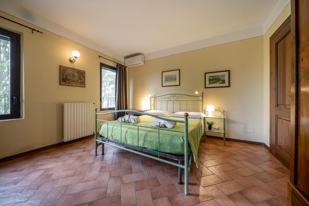 Postel nebo postele na pokoji v ubytování Casello A1, Modena sud - Villa Aurora Charming Rooms