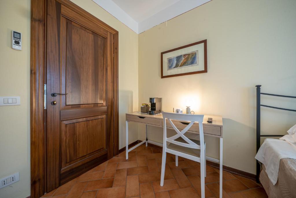 Postel nebo postele na pokoji v ubytování Casello A1, Modena sud - Villa Aurora Charming Rooms