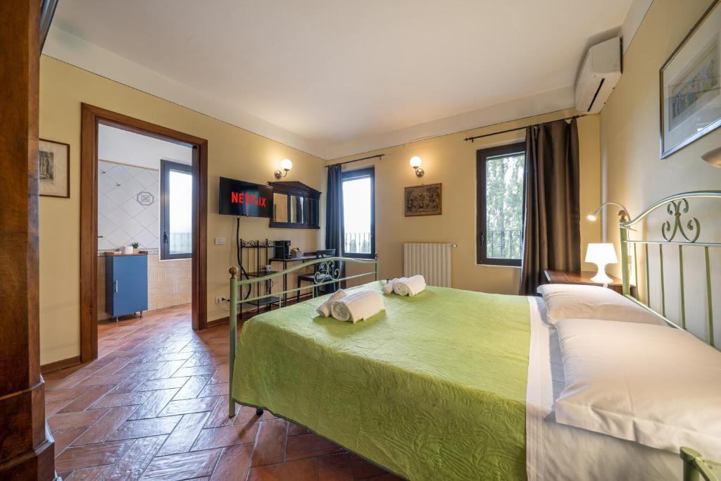Postel nebo postele na pokoji v ubytování Casello A1, Modena sud - Villa Aurora Charming Rooms