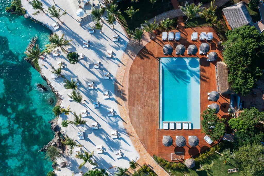 an aerial view of a resort with a swimming pool at Kwanza Resort by SUNRISE in Kizimkazi