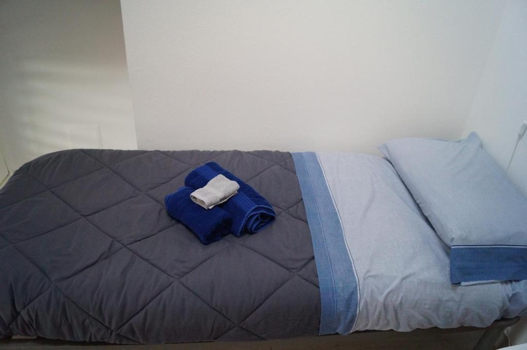 Postel nebo postele na pokoji v ubytování Charme Lake Loft