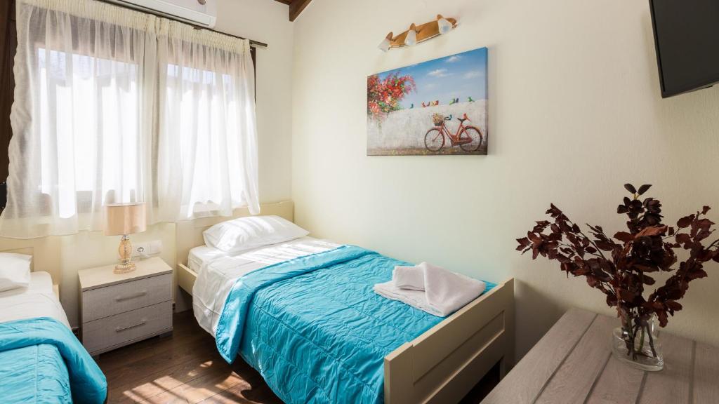 Posteľ alebo postele v izbe v ubytovaní Penelope Home