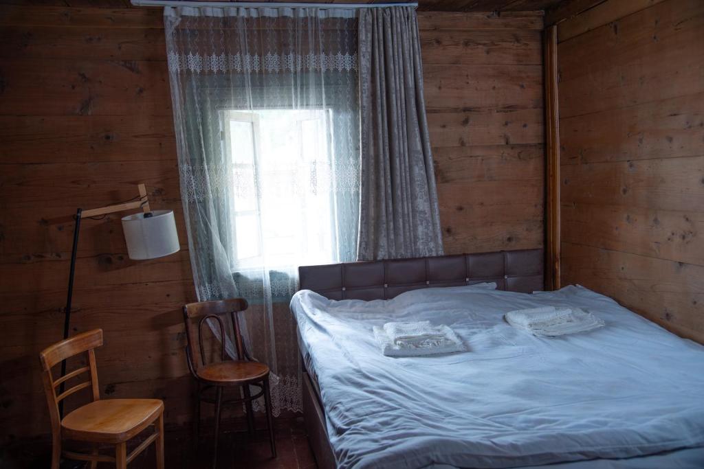 Letto o letti in una camera di Oda