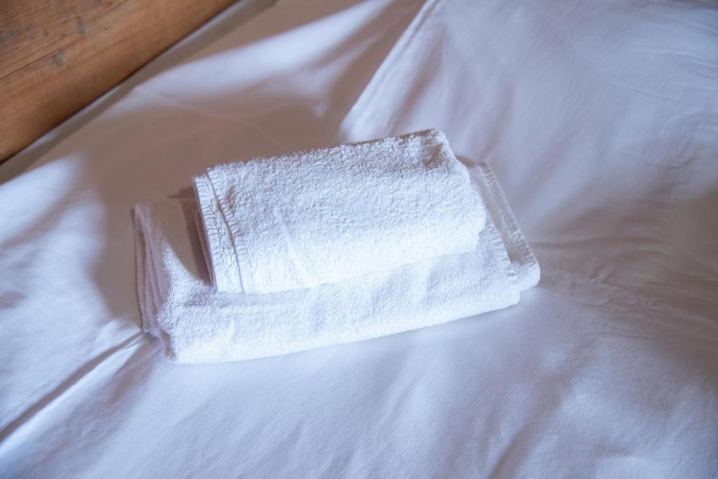 Letto o letti in una camera di Oda