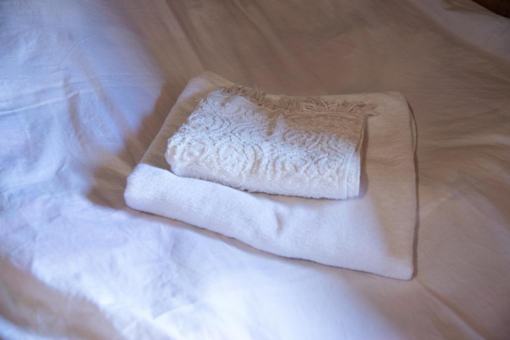 Letto o letti in una camera di Oda