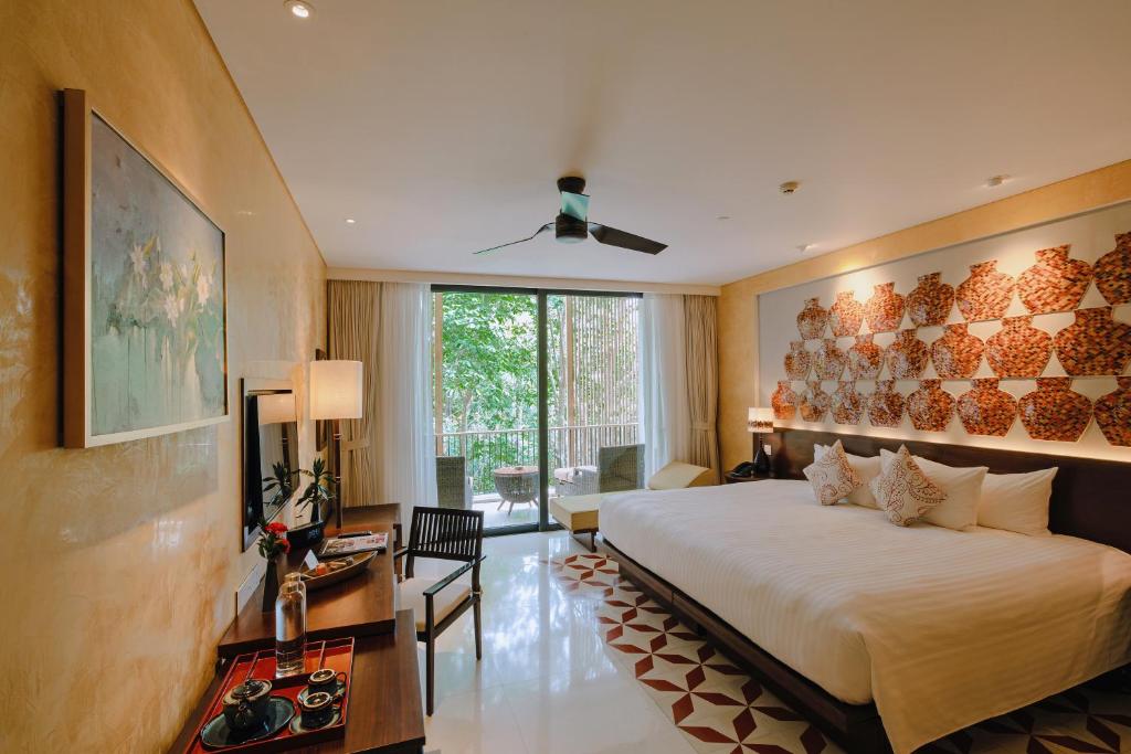 Postel nebo postele na pokoji v ubytování Salinda Resort Phu Quoc - Sparkling Wine Breakfast