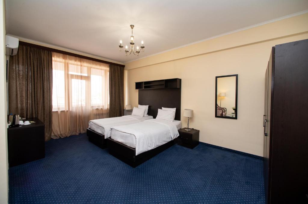 Postel nebo postele na pokoji v ubytování 14 Floor Hotel