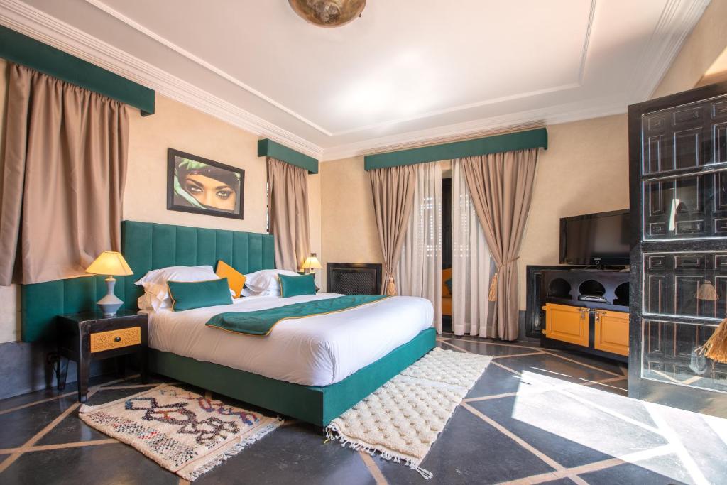 TV a/nebo společenská místnost v ubytování Janat Al Atlas Resort & Spa