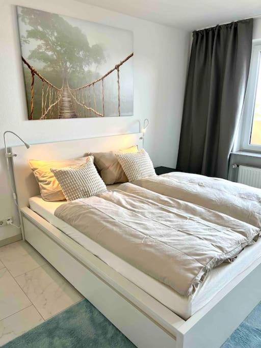 Ένα ή περισσότερα κρεβάτια σε δωμάτιο στο Apartment Würzburg