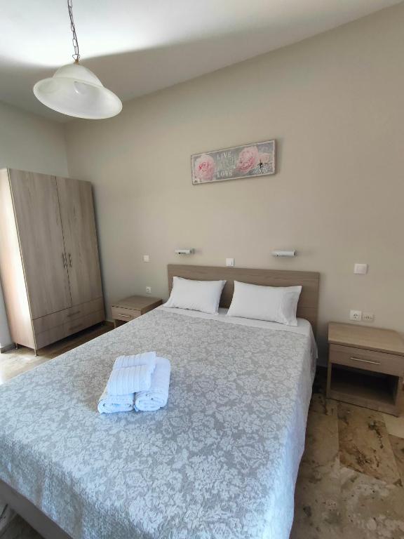 Posteľ alebo postele v izbe v ubytovaní Dionisos Apts Gouvia by Estia