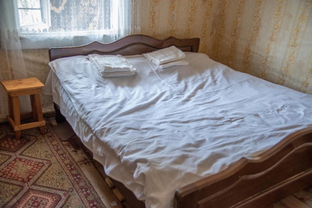 Letto o letti in una camera di Oda