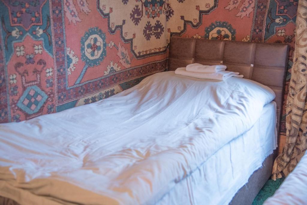 Letto o letti in una camera di Oda