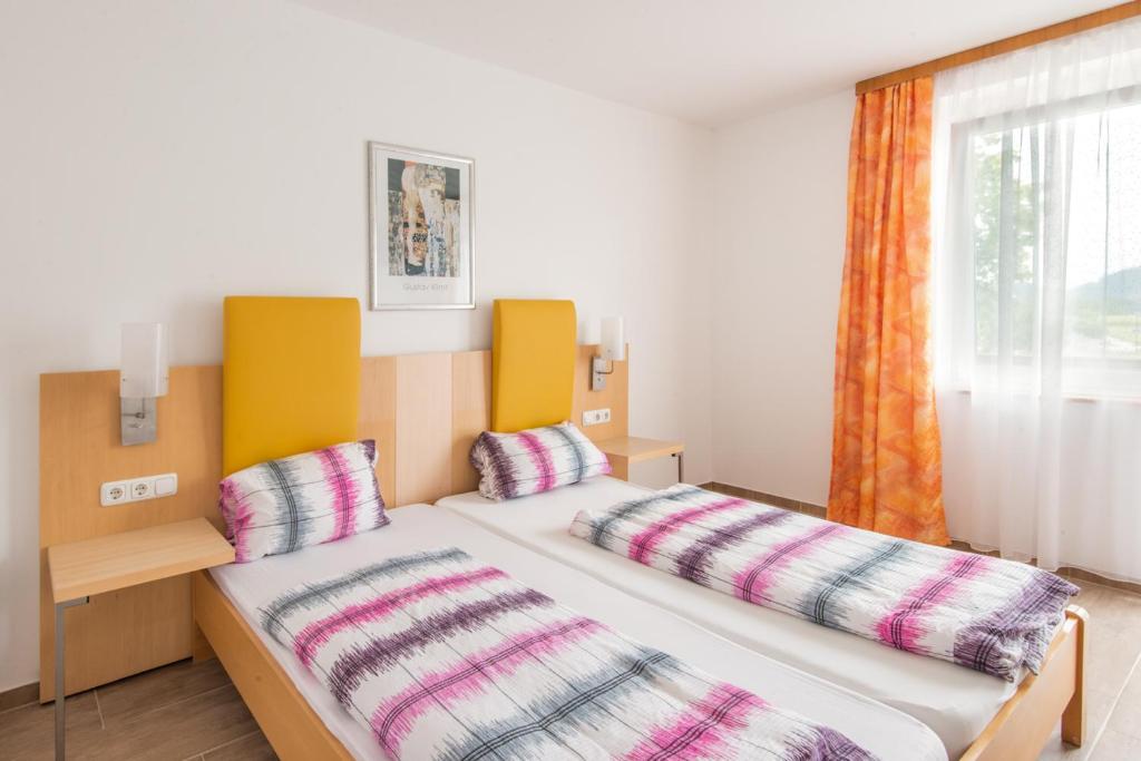 Postel nebo postele na pokoji v ubytování Bed & Breakfast Eckwirt