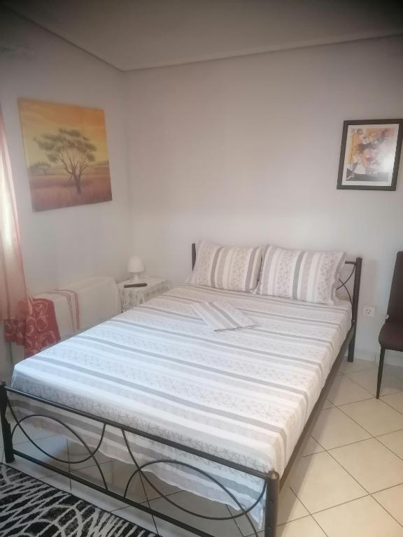 Postel nebo postele na pokoji v ubytování Penthouse in Volos