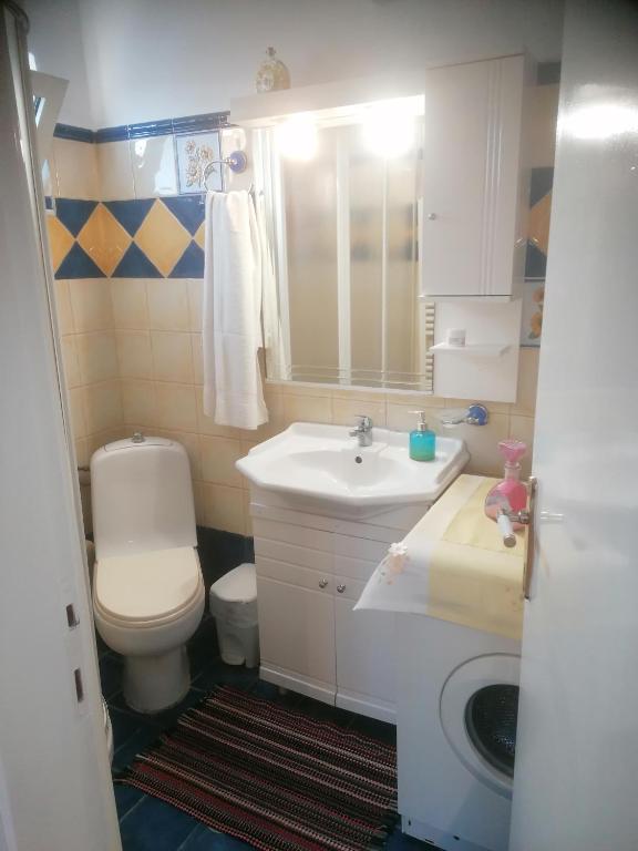 Koupelna v ubytování Penthouse in Volos