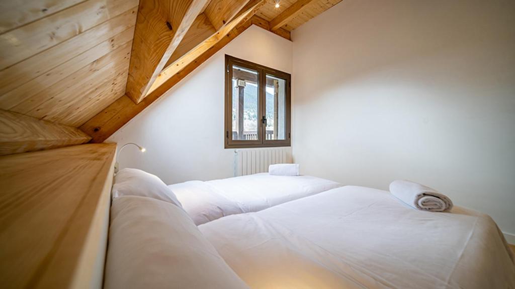 Voodi või voodid majutusasutuse Aran Hostel toas