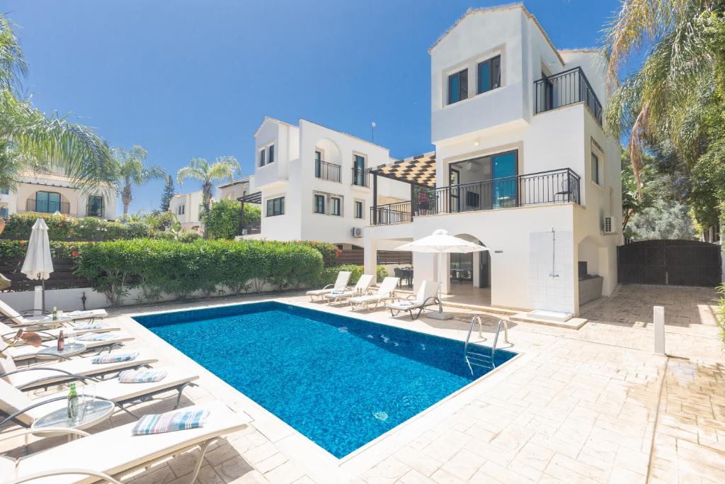 an image of a villa with a swimming pool at Mylos Villas in Protaras