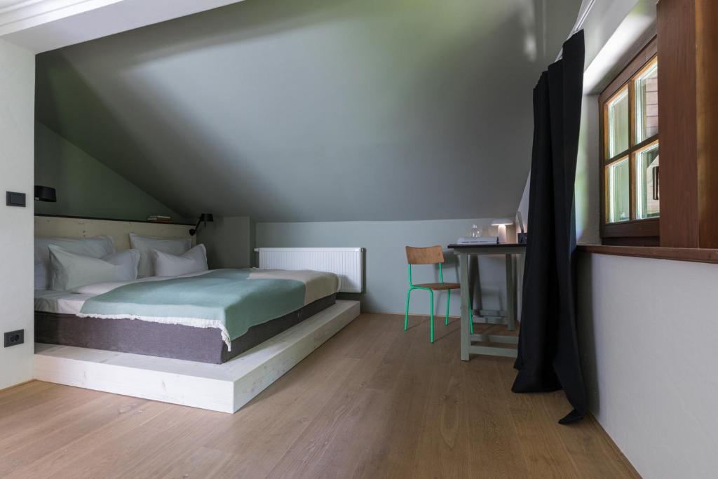 Postel nebo postele na pokoji v ubytování Blyb Hotel