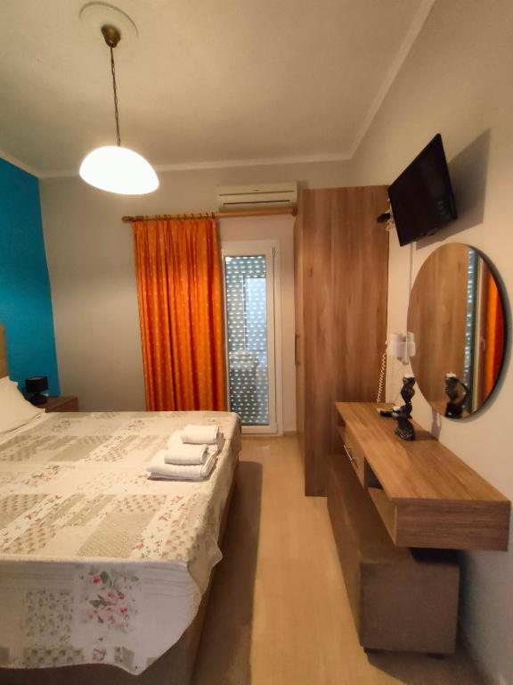 Posteľ alebo postele v izbe v ubytovaní Dionisos Apts Gouvia by Estia