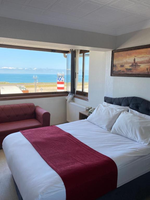 Postel nebo postele na pokoji v ubytování Elite Holiday Hotel