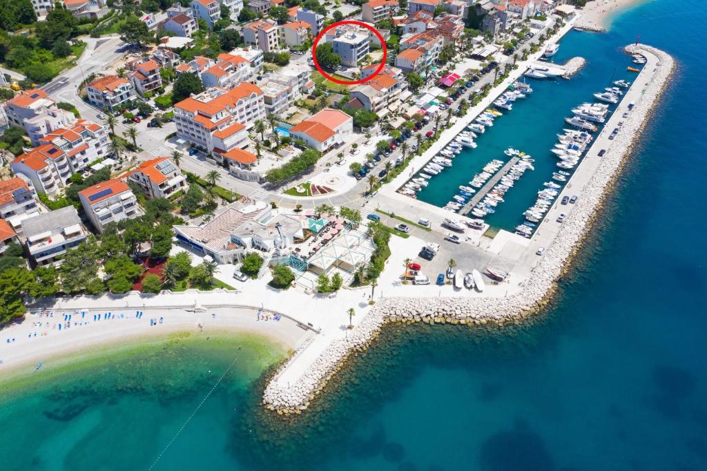 an aerial view of a harbor with a marina at Emilia Lofts in Tučepi