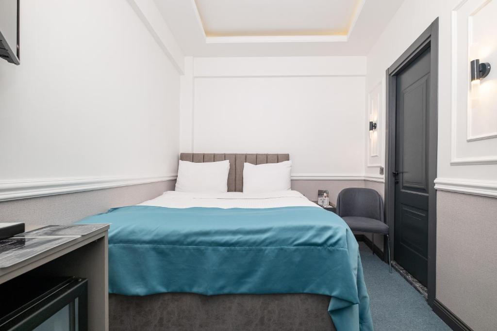 Postel nebo postele na pokoji v ubytování Askadar May Otel