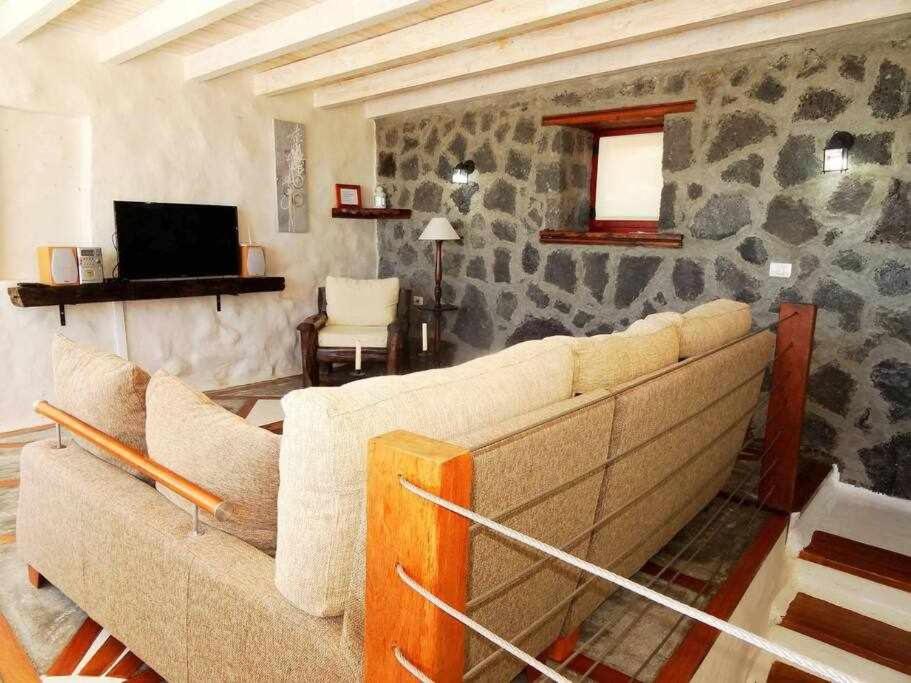 TV a/nebo společenská místnost v ubytování Casa Yuno en La Asomada