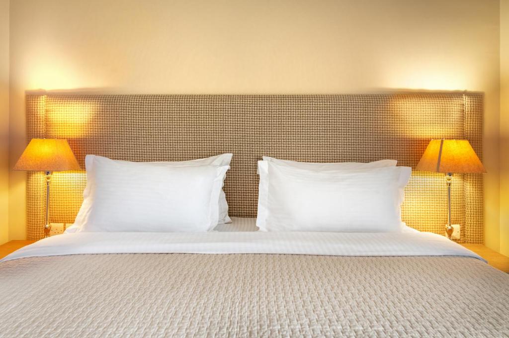 Postel nebo postele na pokoji v ubytování GINGER Hotel