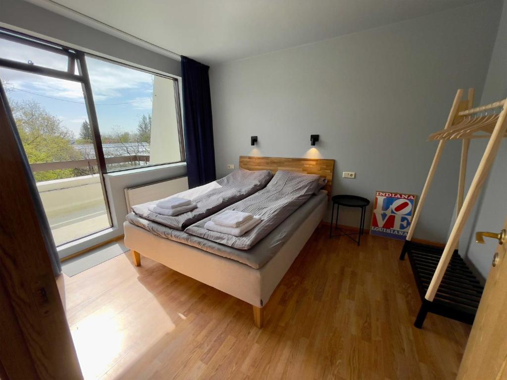 Postel nebo postele na pokoji v ubytování Matkráin Apartments