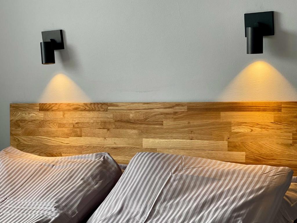 Postel nebo postele na pokoji v ubytování Matkráin Apartments