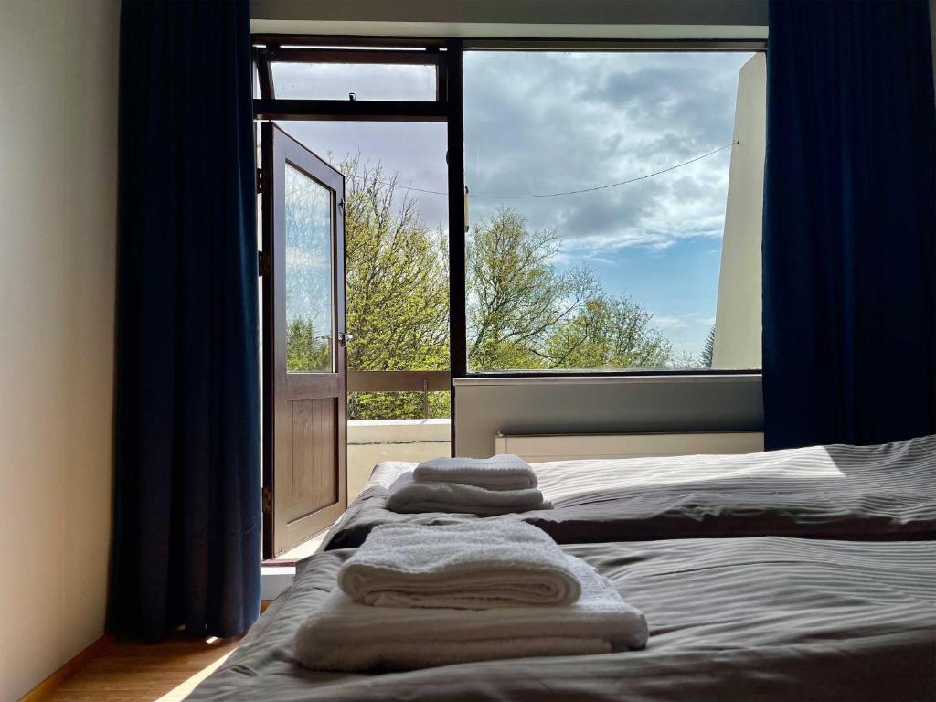 Postel nebo postele na pokoji v ubytování Matkráin Apartments
