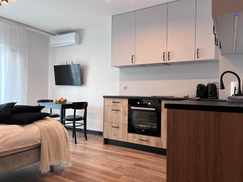 Kuchnia lub aneks kuchenny w obiekcie apartamenty-wroc Kurkowa