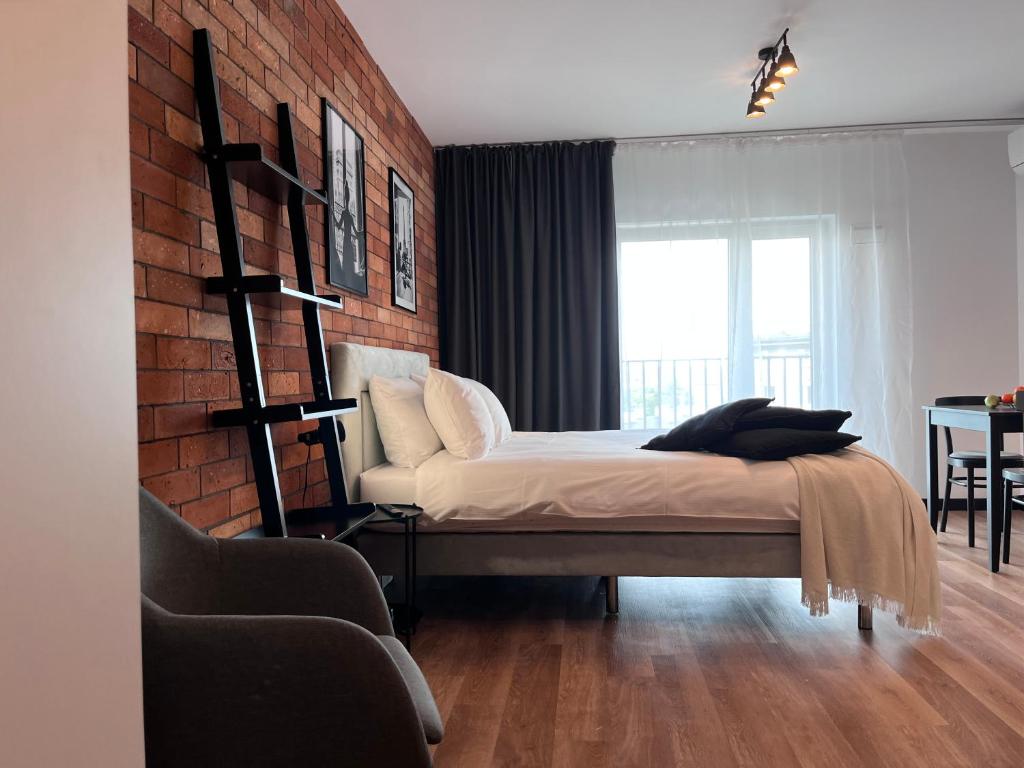 Łóżko lub łóżka w pokoju w obiekcie apartamenty-wroc Kurkowa