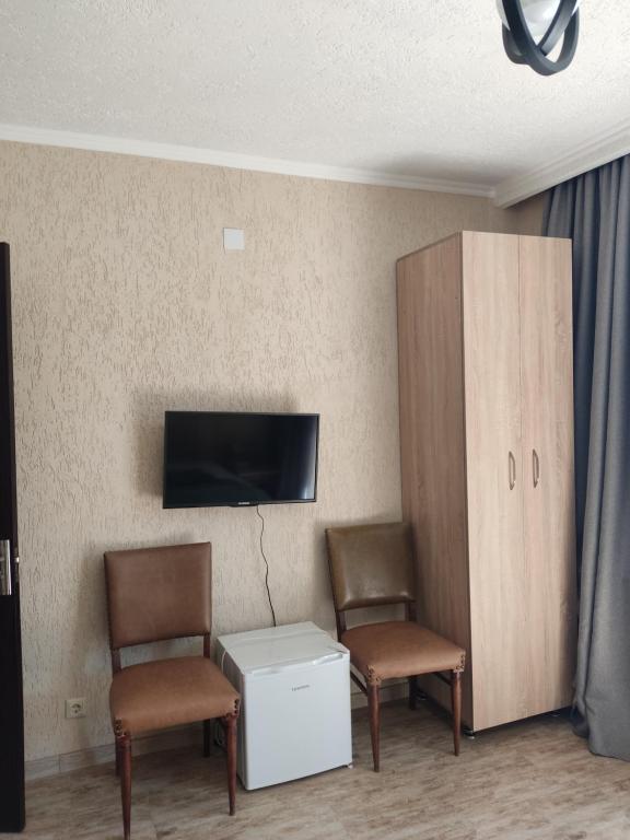 TV a/nebo společenská místnost v ubytování kaprovani Kako