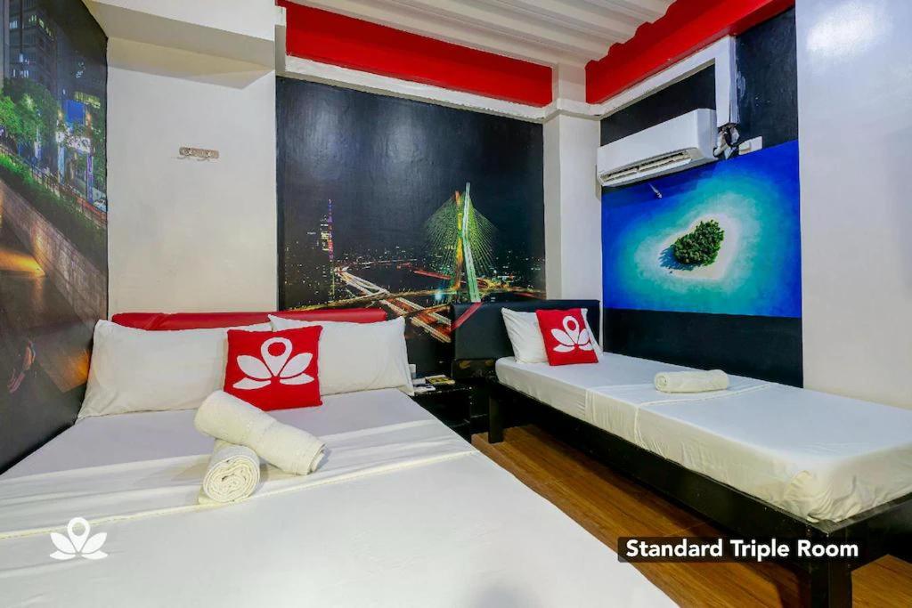 Postel nebo postele na pokoji v ubytování Sabel Travelers Inn