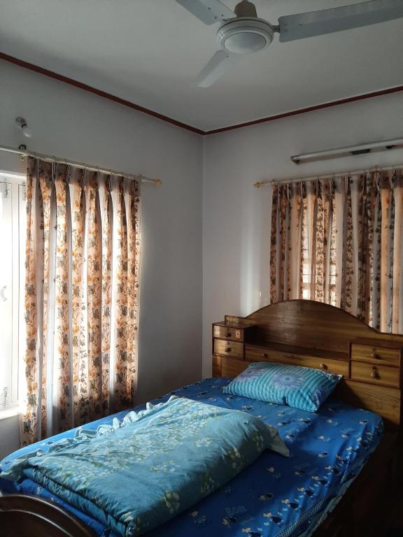 Postel nebo postele na pokoji v ubytování juneli raat homestay pokhara