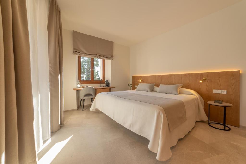Postel nebo postele na pokoji v ubytování Nema Boutique Hotel & Spa