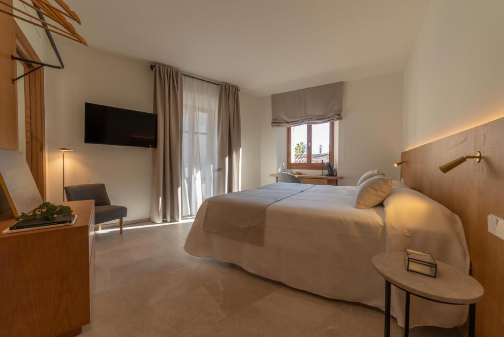 TV a/nebo společenská místnost v ubytování Nema Boutique Hotel & Spa
