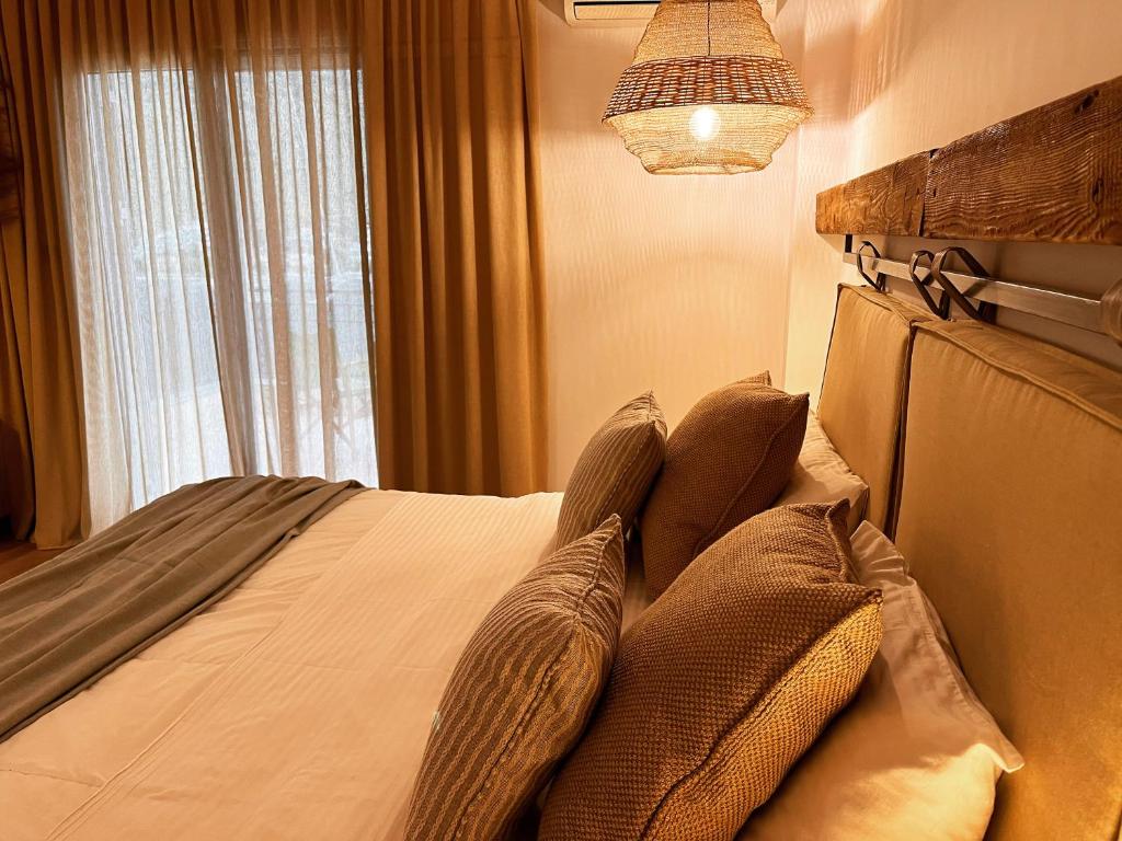 A bed or beds in a room at Evia Silence