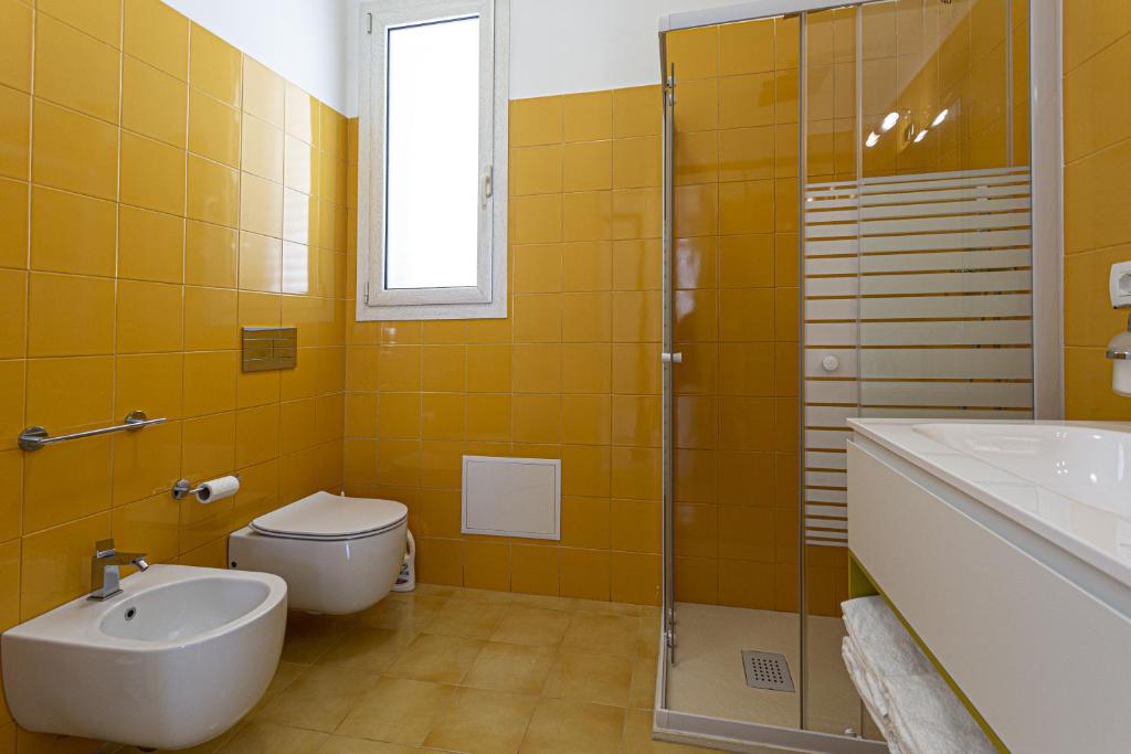 Koupelna v ubytování Milocca Homes